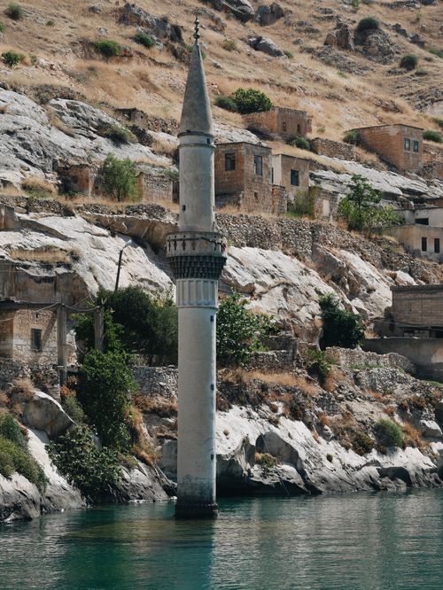 Free Explore the iconic submerged minaret in Savaşan Village, a unique landmark in Şanlıurfa, Türkiye. Stock Photo