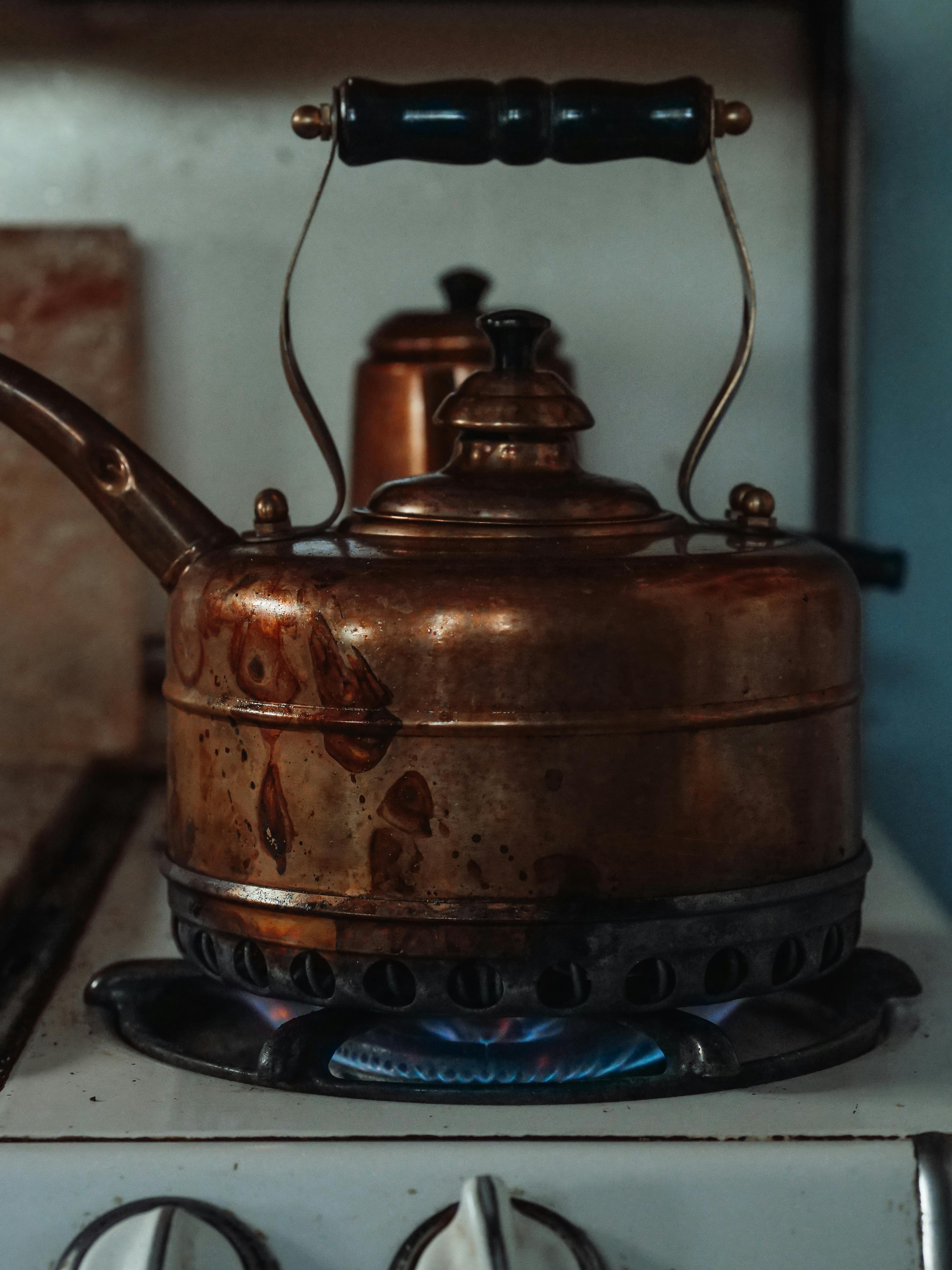 a kettle on a gas stove