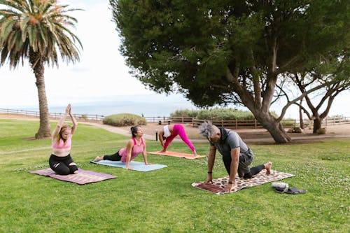 An Elderly People Doing Yoga at the Park