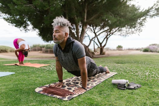 A group practicing yoga in a scenic outdoor park, promoting wellness and relaxation.
