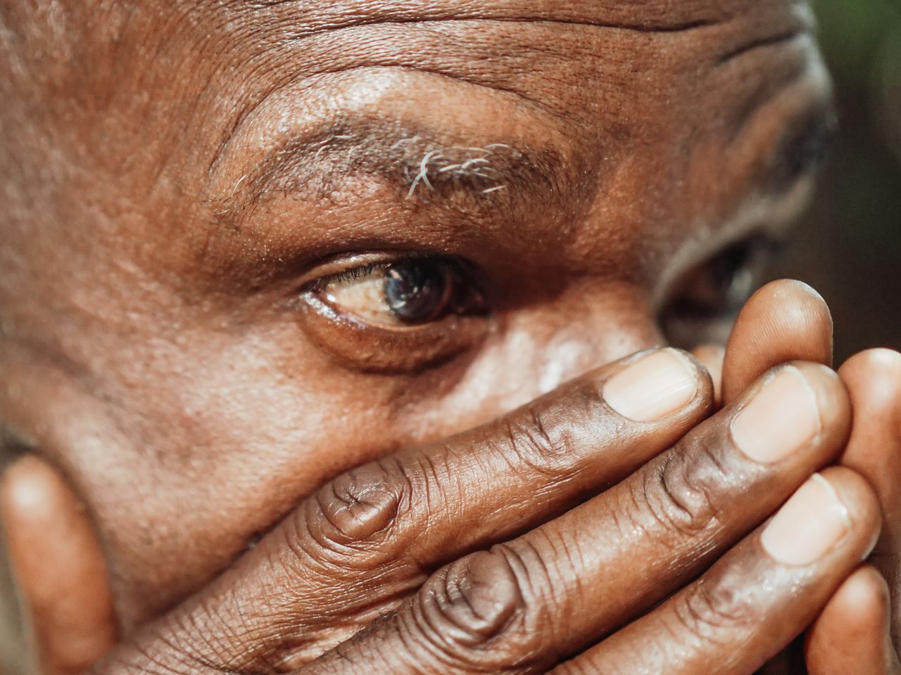 close up view of a senior man s contemplative expression highlighting