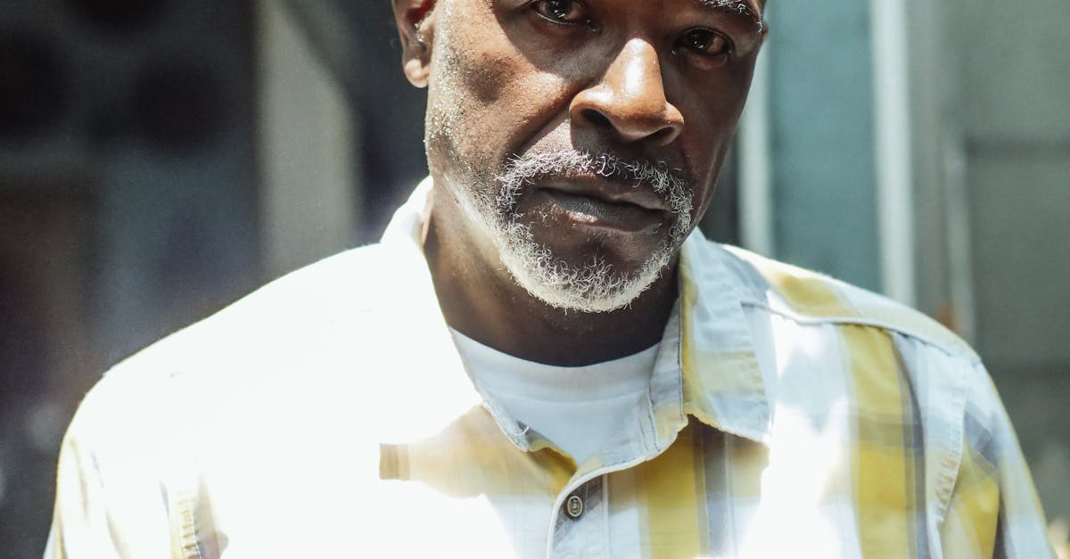 Man in Yellow and White Button Up Shirt