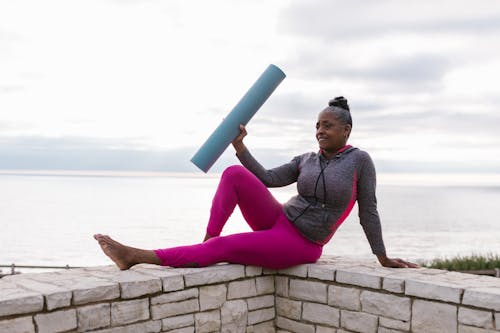 A Woman Holding Yoga Mat