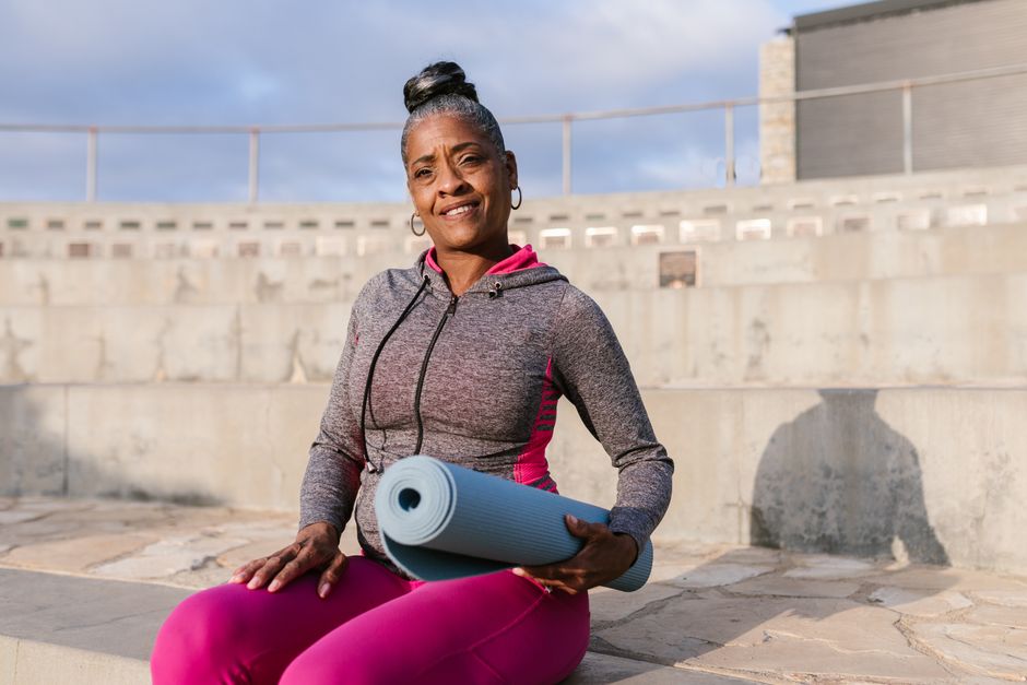 Woman foam rolling for muscle recovery and flexibility benefits