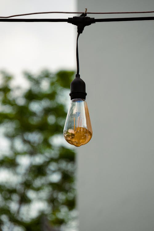 Close-Up Photo of hanging Light Bulb