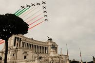 Air show above Victor Emmanuel Monument with sculptures in city