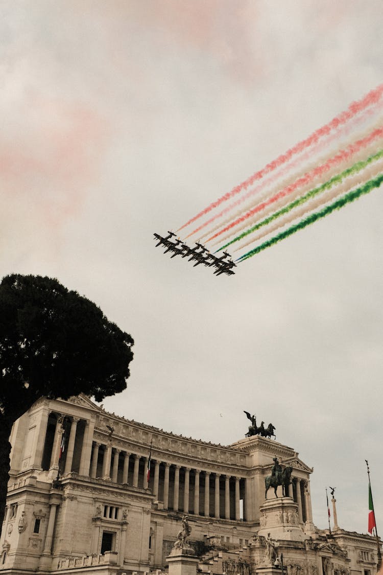 Air Show Above Victor Emmanuel Monument With Statues In City