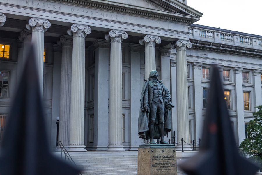 The US Treasury Department building in Washington with the Albert Gallatin statue in front