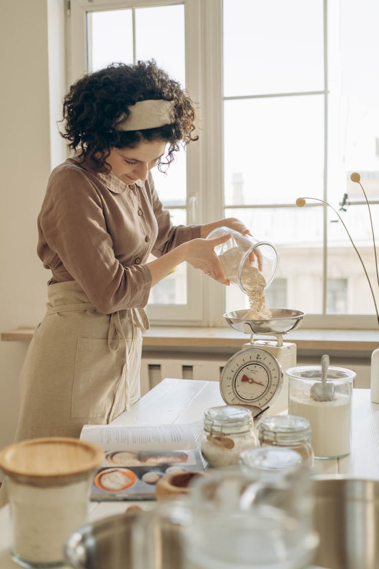 Woman Cooking In Kitchen