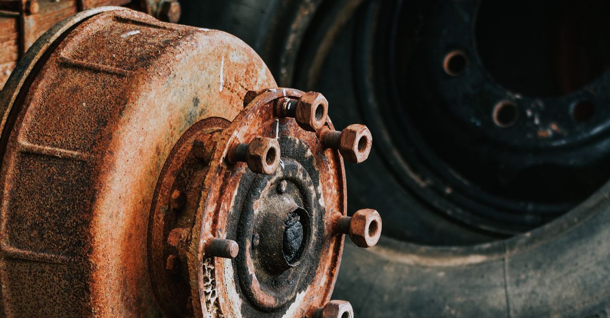 Nice Rims On A Rusted Car Rusty and Abandoned Car Rim and Tires ยท Free Stock Photo