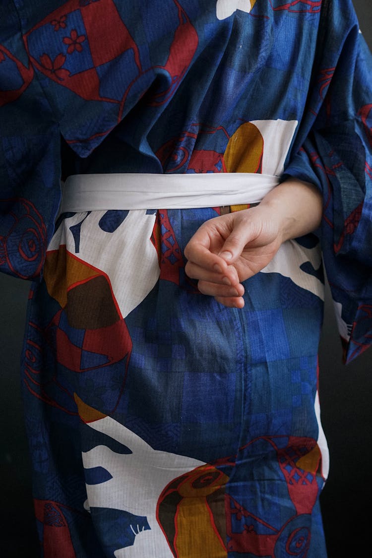 Person Wearing A Printed Kimono And White Belt