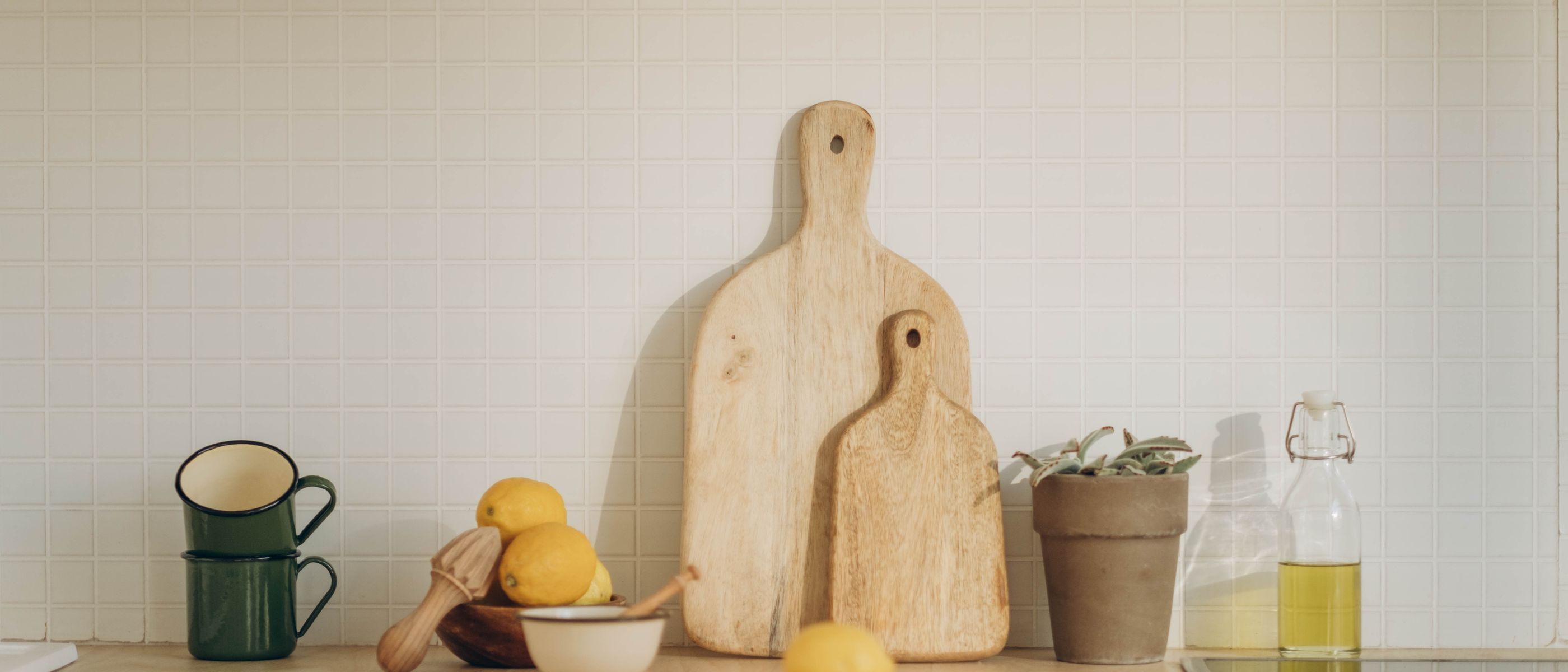 Kitchen Spraying in Isle of Dogs — a decorator at work mid-project