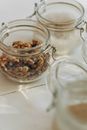 Brown and Black Food in Clear Glass Jar