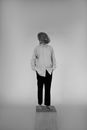 Man in White Dress Shirt and Black Pants Standing