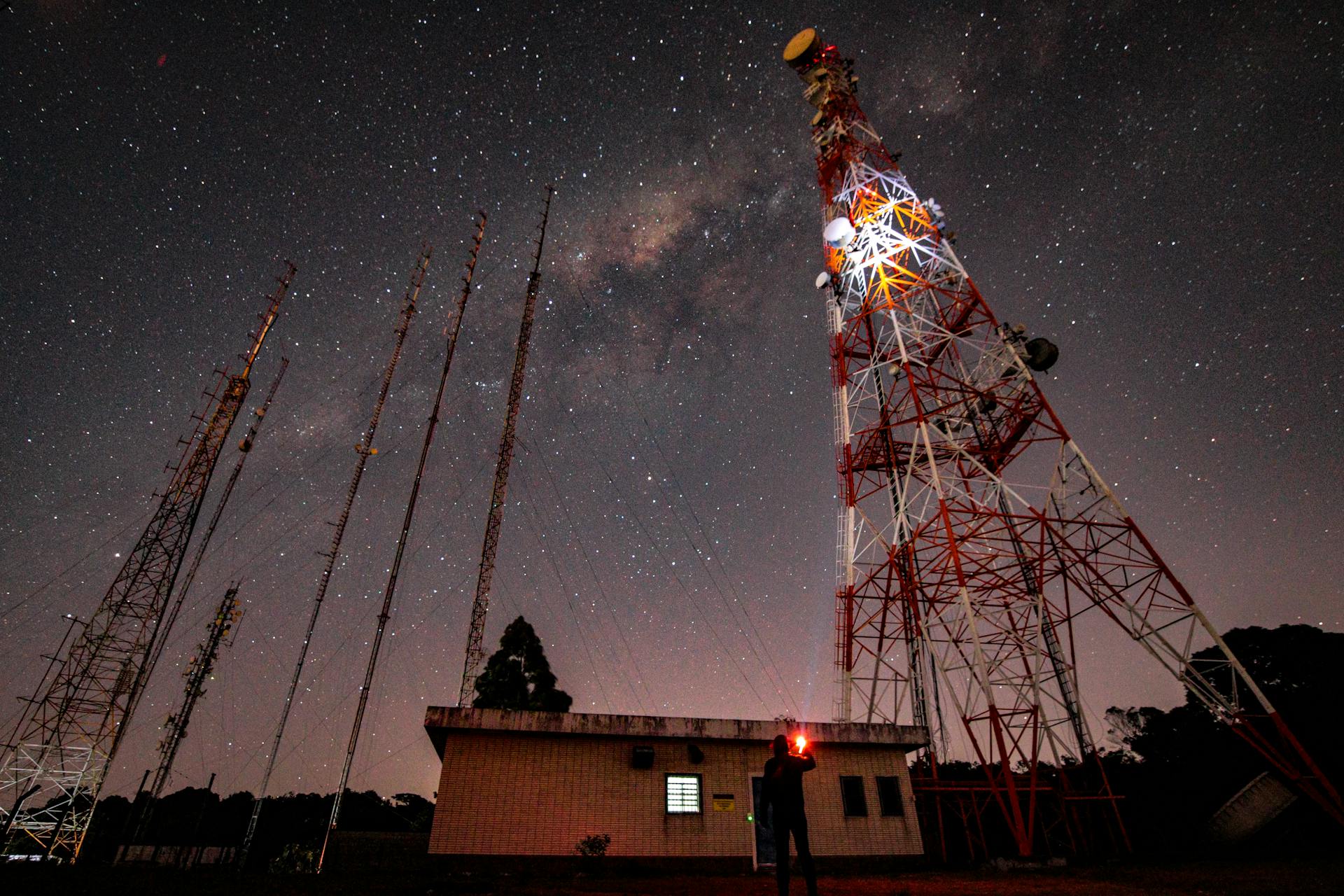 Transmission Towers under a Night Sky