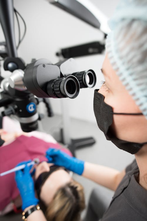 Woman During Dentist Treatment