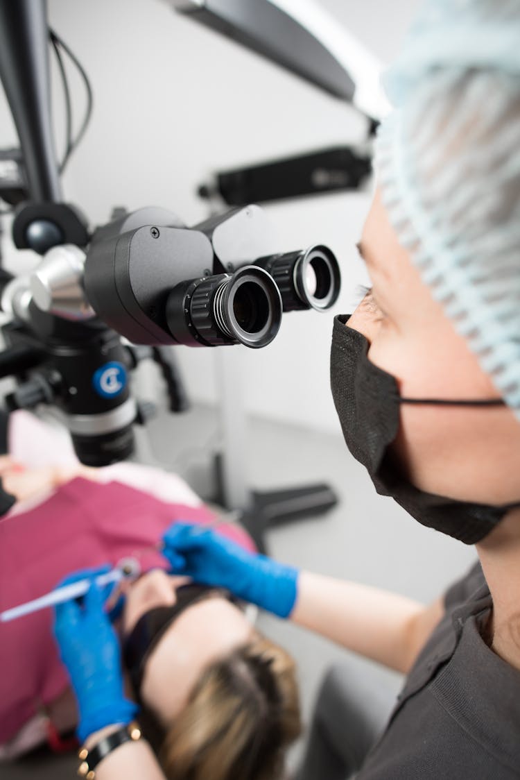 Woman During Dentist Treatment