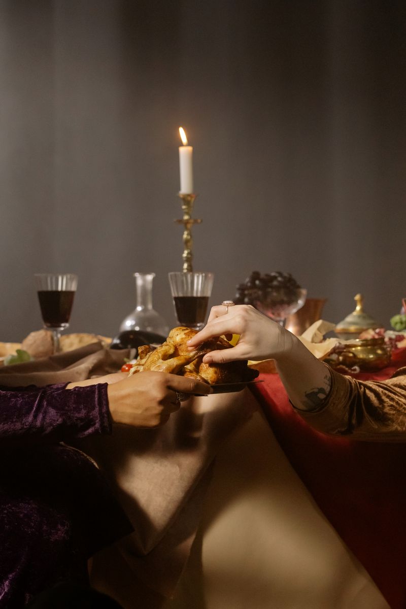 A baroque-styled fairytale feast table with candles and abundant dishes