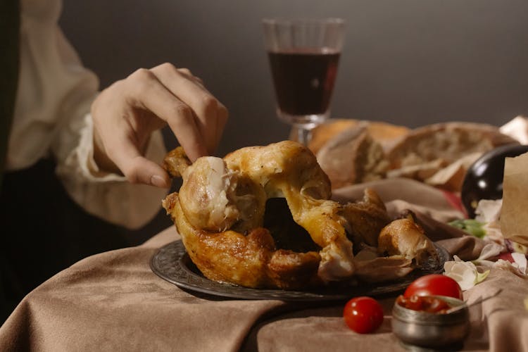 Chicken And Bread On Renaissance Style Table 