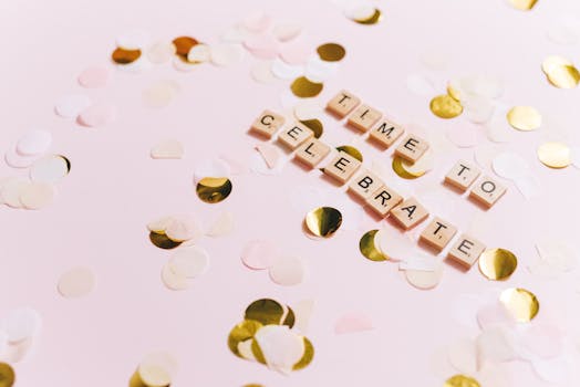 Celebrate with festive confetti and Scrabble letters spelling 'Time to Celebrate' on pink background.