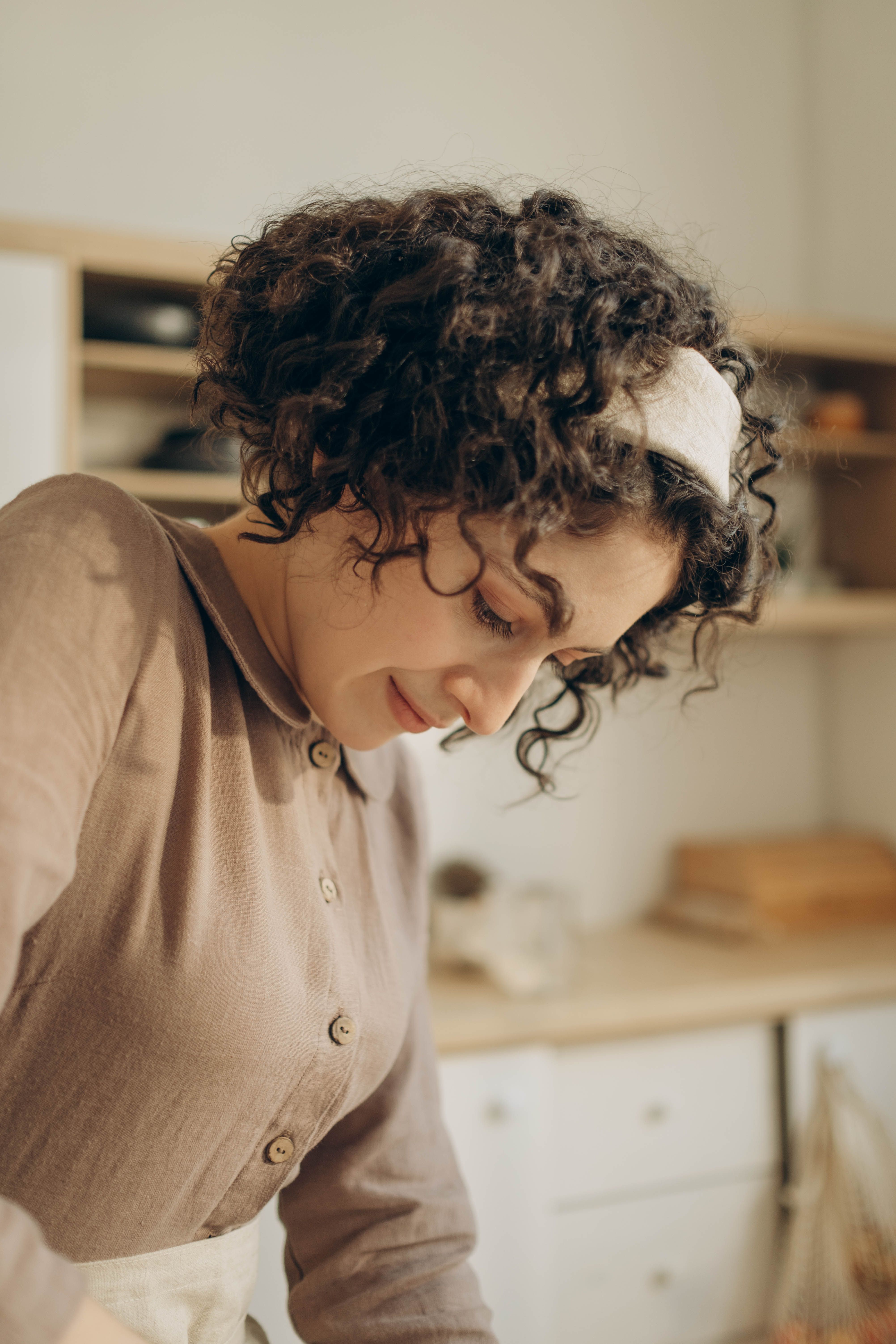Woman in Brown Long Sleeve Shirt · Free Stock Photo
