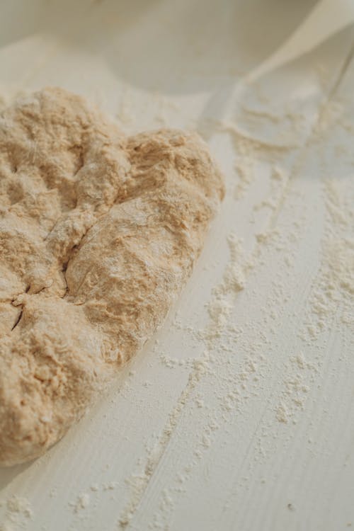 Brown Dough on White Wooden Surface