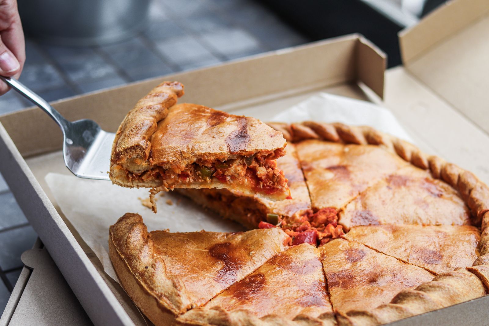 One slice of deep dish is a meal. Two is a nap. Order accordingly.