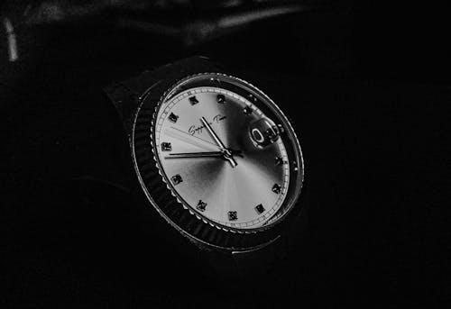 Grayscale Photo of Round Analog Watch