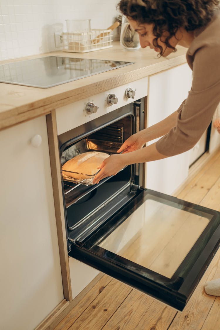 
A Woman Baking Bread