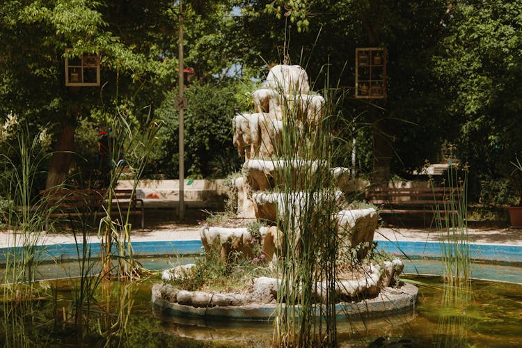 A Neglected Fountain In A Park