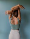 Back View of a Woman in Green Tank Top