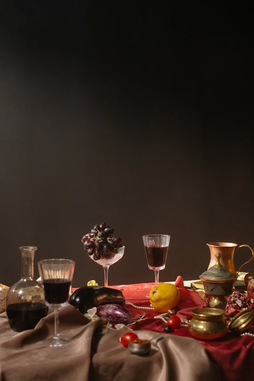 Close-up Photo of Wine Glasses on Table 