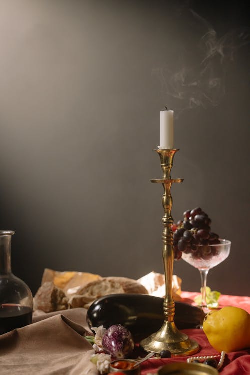 Long Gold Candle Holder on the Table
