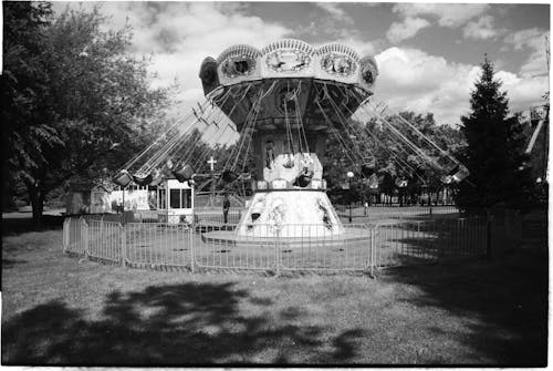 Grayscale Photo of a Carousel 