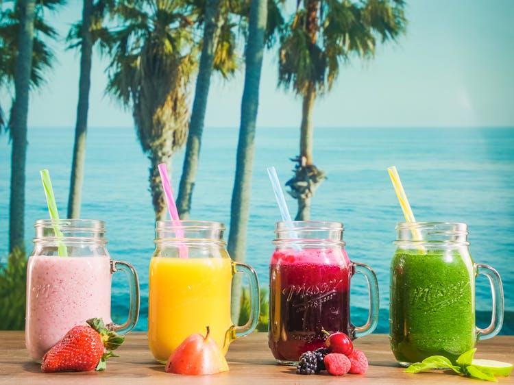 Variety Of Fruit Drinks On Mason Jar 