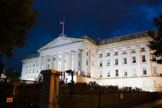 U.S. Treasury building illuminated at dusk