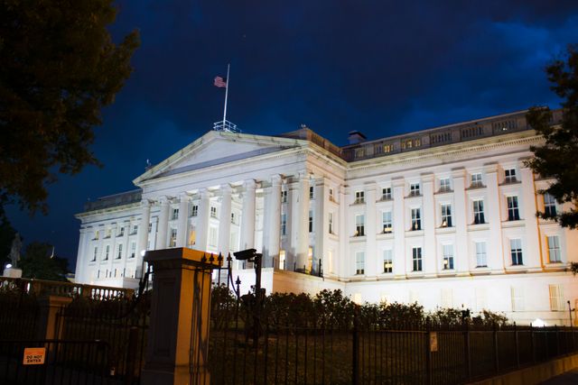 U.S. Treasury building illuminated at dusk