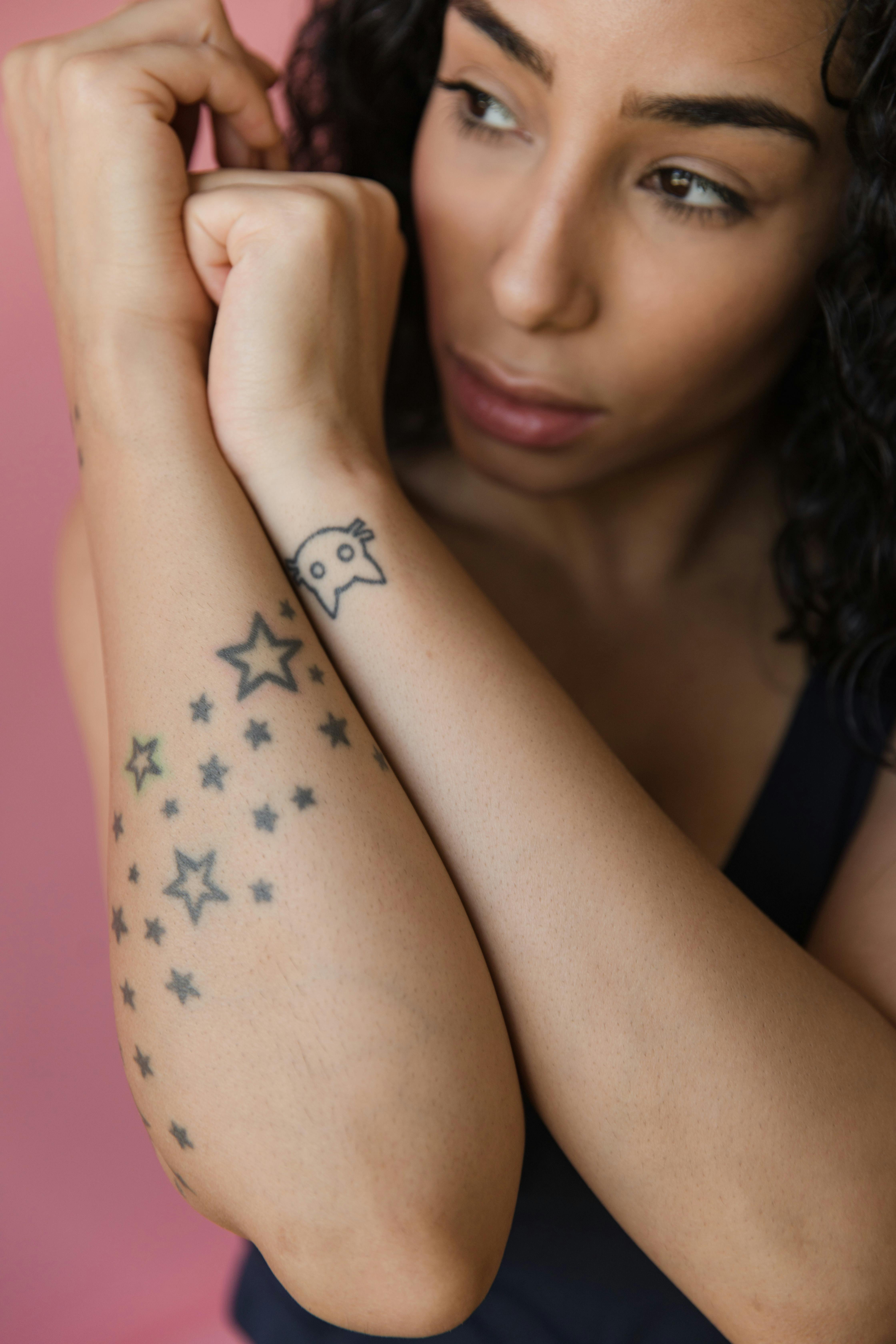 bicep tattoos for women