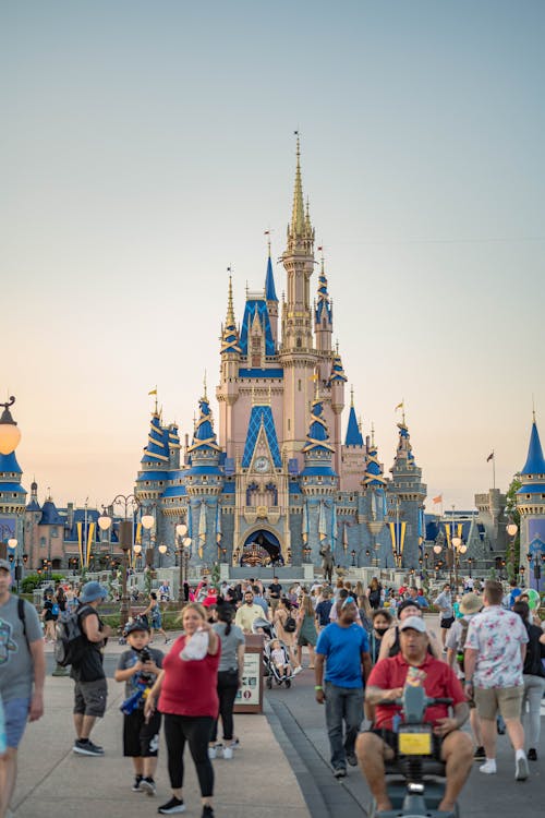 Free People near the Cinderella Castle in Disney World  Stock Photo