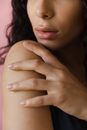 Close-up Photo of Woman's Hand on her Shoulder