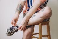 Man With Black Tattoo on His Right Arm