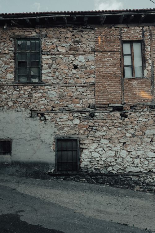 Free Historic stone and brick facade of a traditional house in Edessa, Greece. Stock Photo