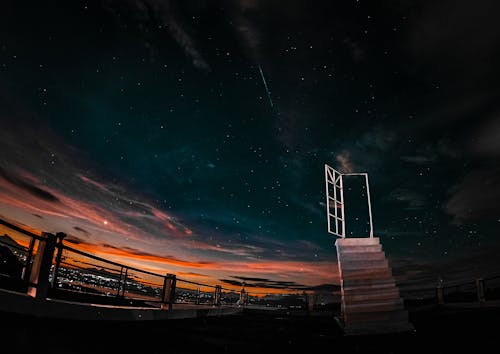 Free Concept of a Stairway to Heaven on a Rooftop Stock Photo