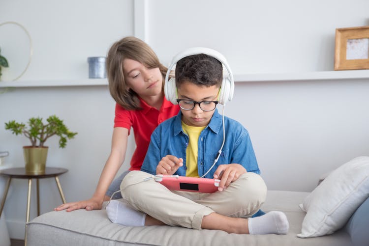 Kids Playing Video Games On A Tablet