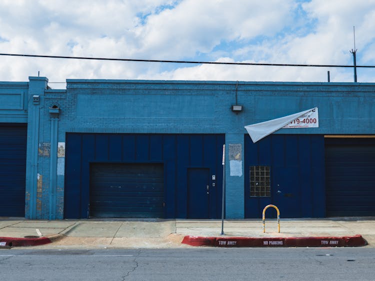 Banner Hanging Above Garage Entrance