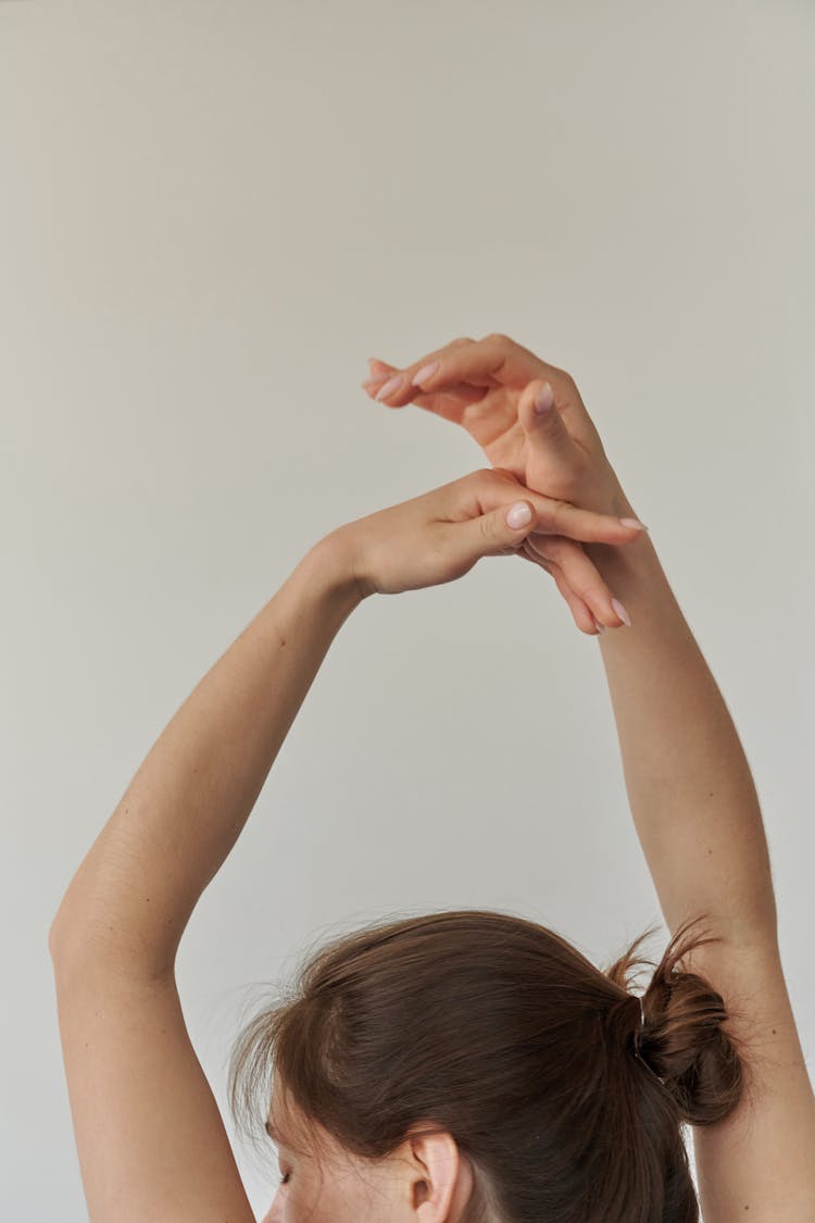 Woman With Her Arms Raised 