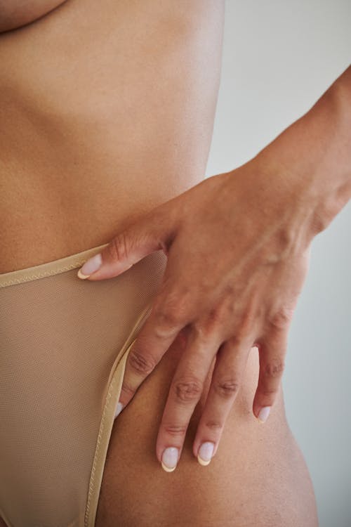 Free A Person Wearing Brown Panty Stock Photo