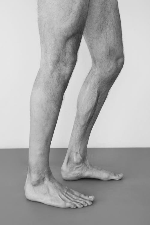 Free Grayscale Photo of Mans Legs Stock Photo