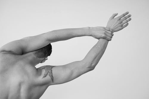 Grayscale Studio Shoot of Mans Arms 