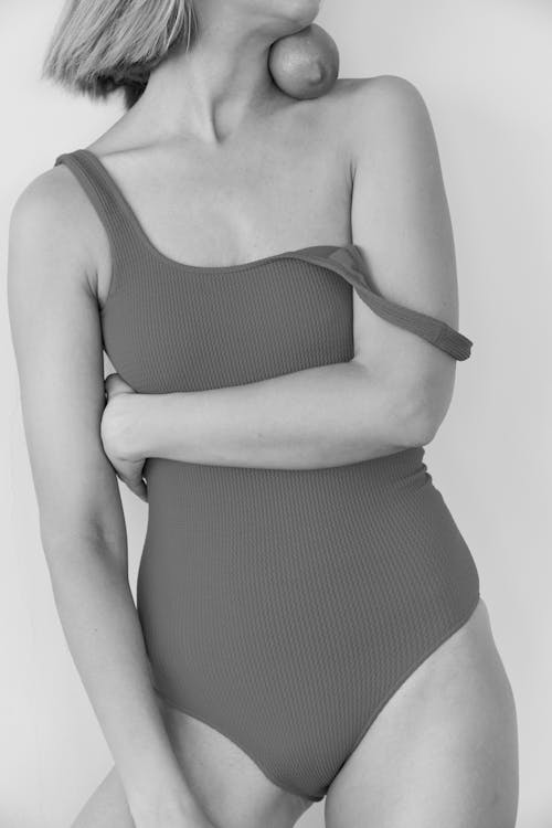 Grayscale Photo of a Woman in Swimsuit